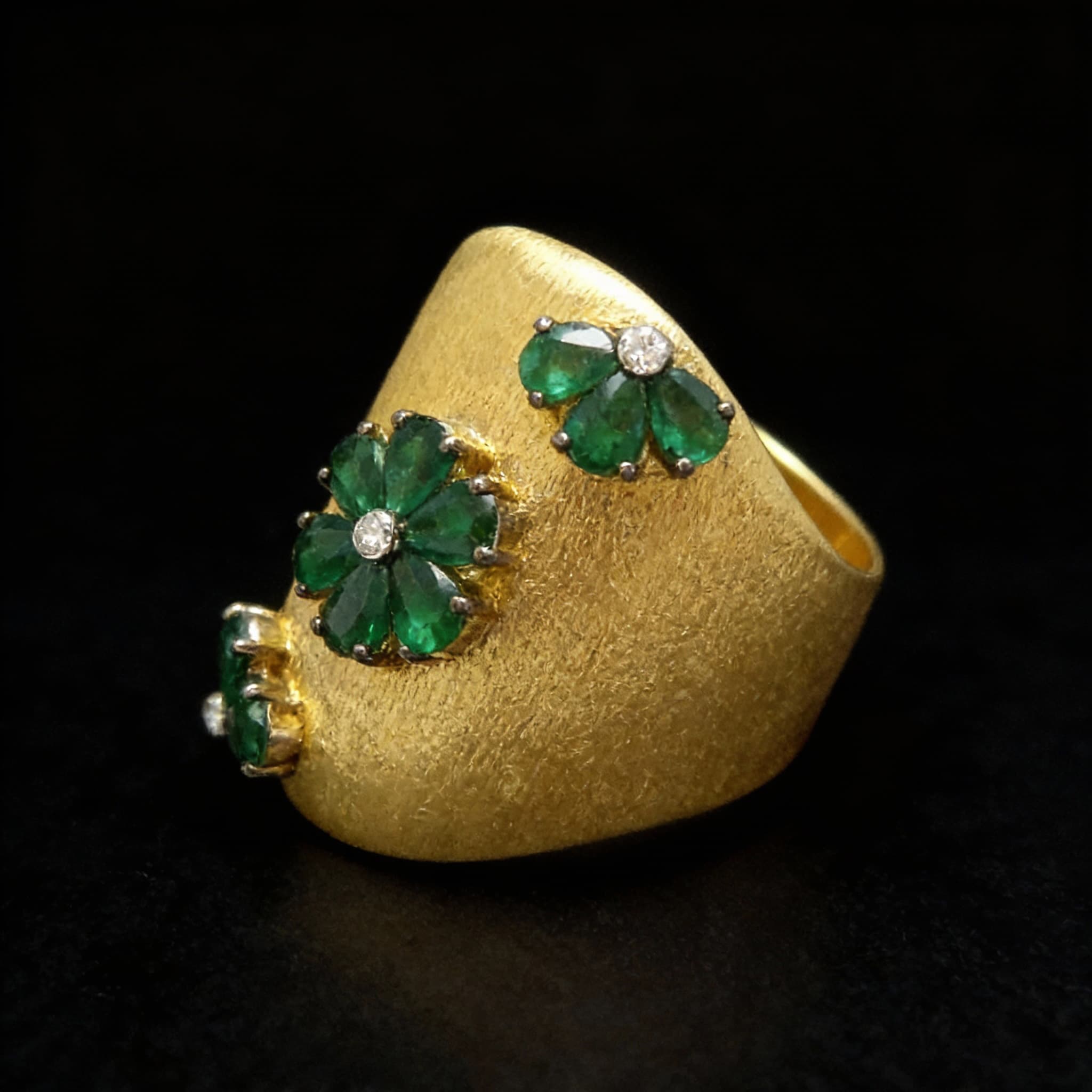 The Peregrinus Emerald Trio Bloom Ring