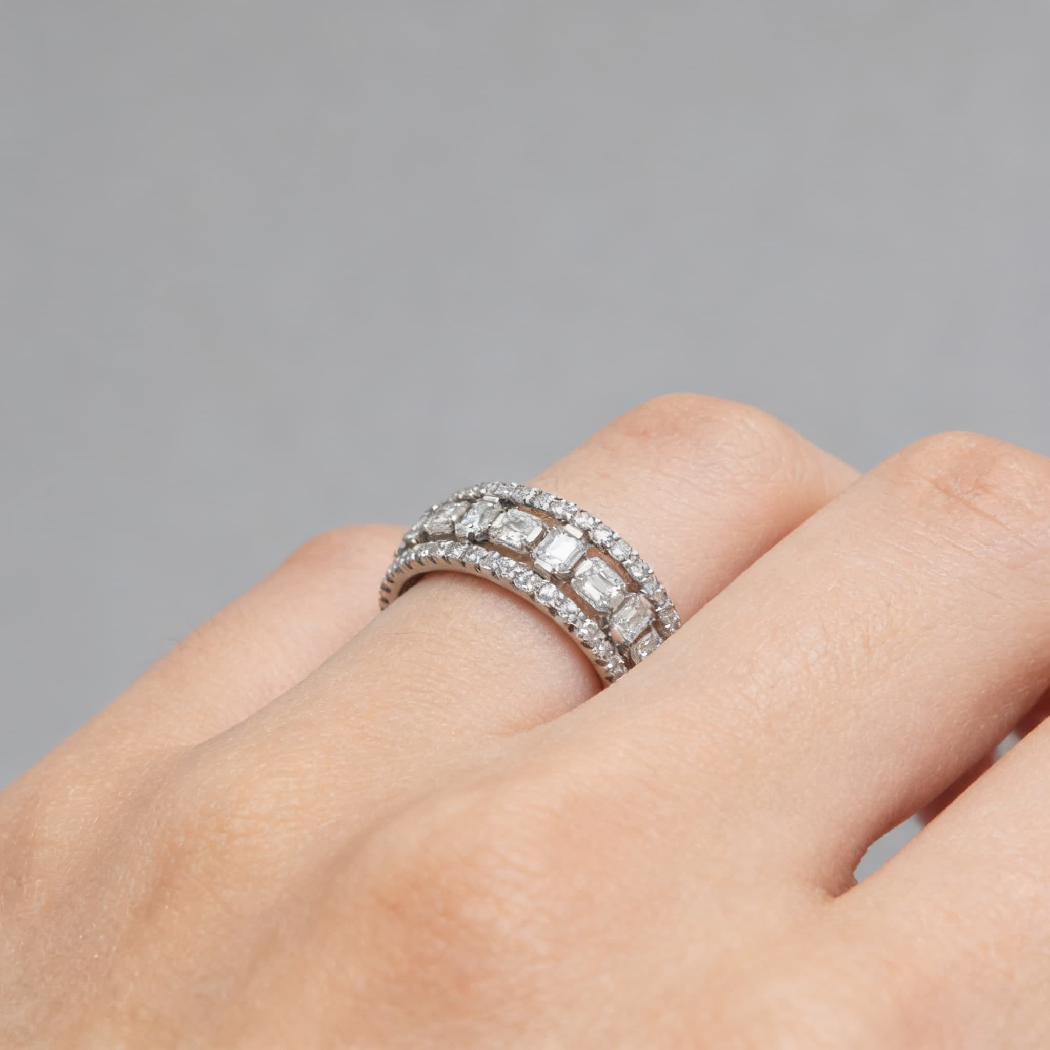 The Eternità Emerald-Cut Diamond Eternity Ring with Pavé Borders