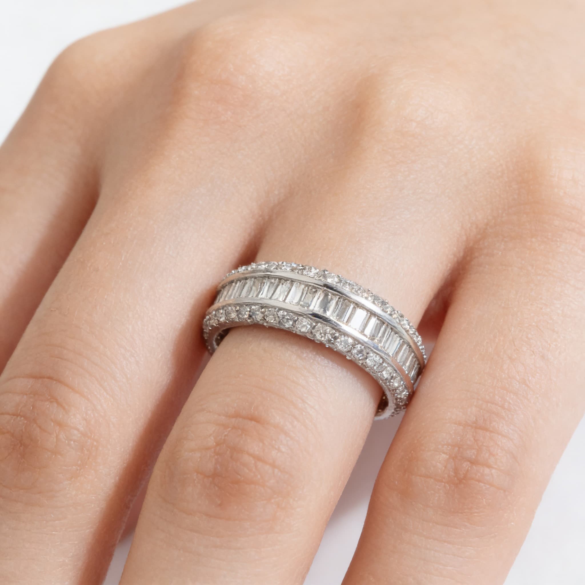 The Eternità Parallel Baguette Diamond Ring with Pavé Frame