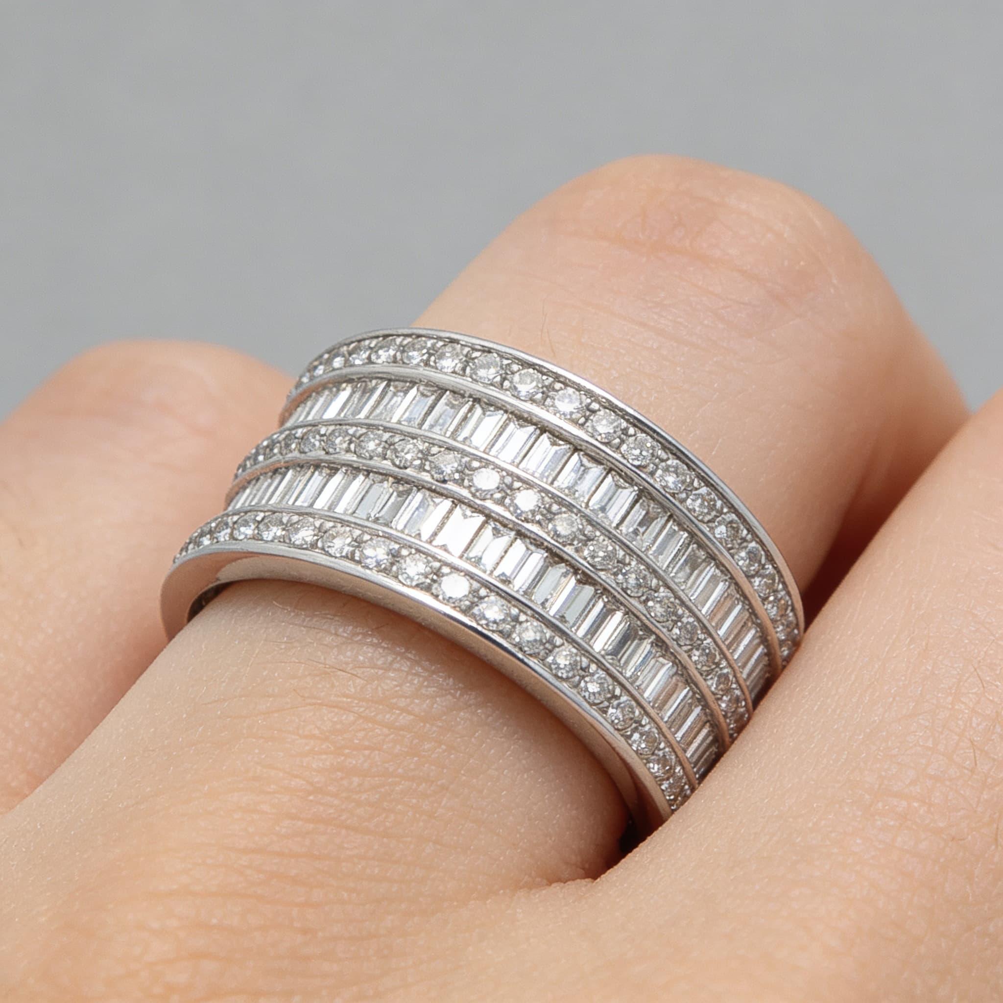 The Eternità Stratified Baguette Diamond Ring with Pavé Bands