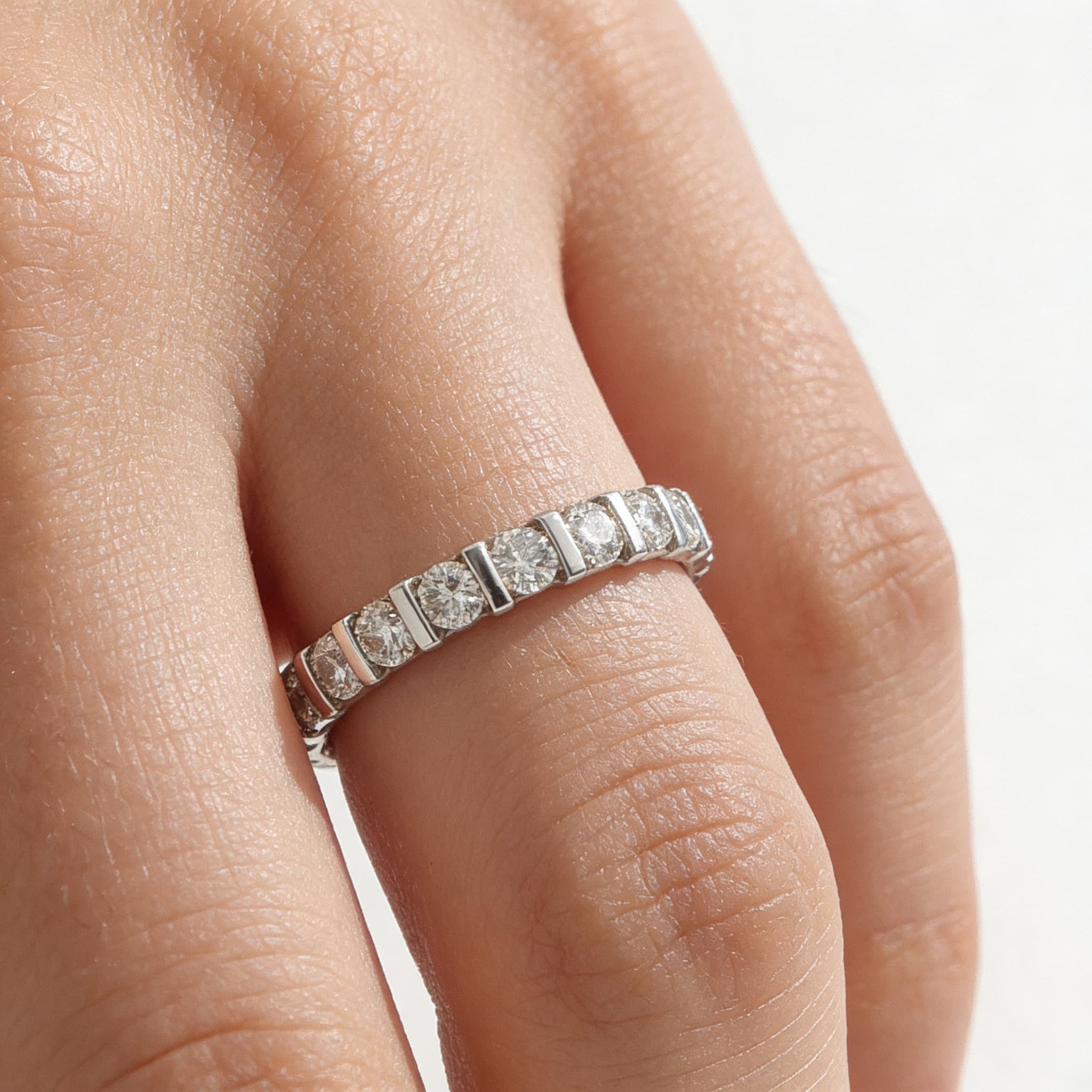The Eternità Raised Bar-Set Round Diamond Eternity Ring