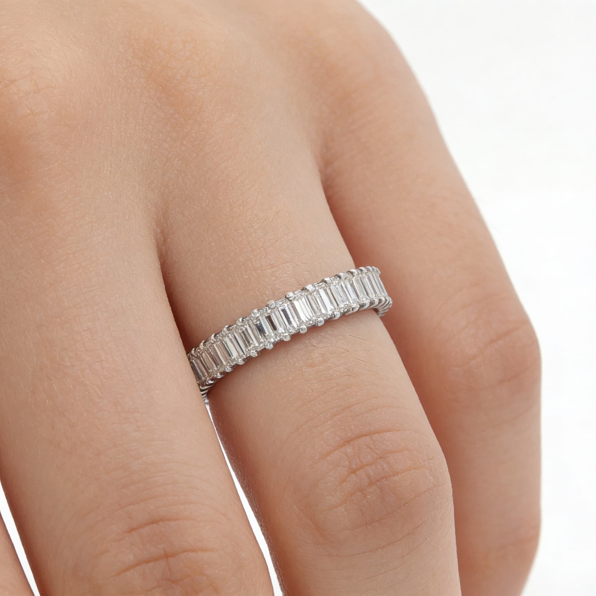 The Eternità Four-Prong Baguette Diamond Eternity Ring