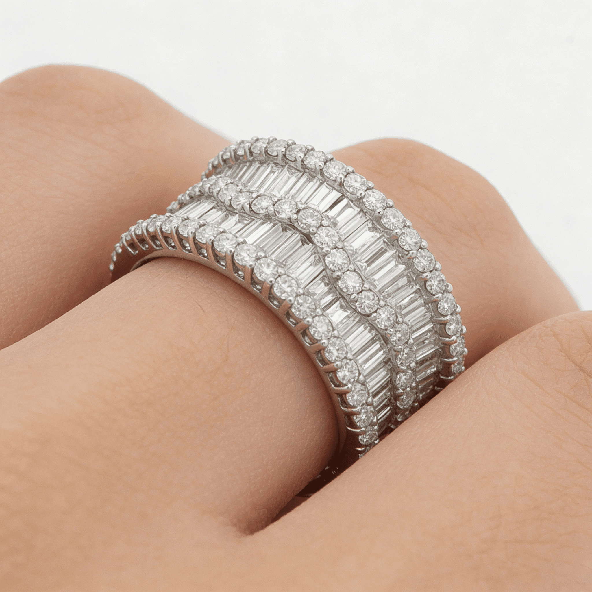 The Eternità Raised Gallery Baguette and Round Eternity Ring
