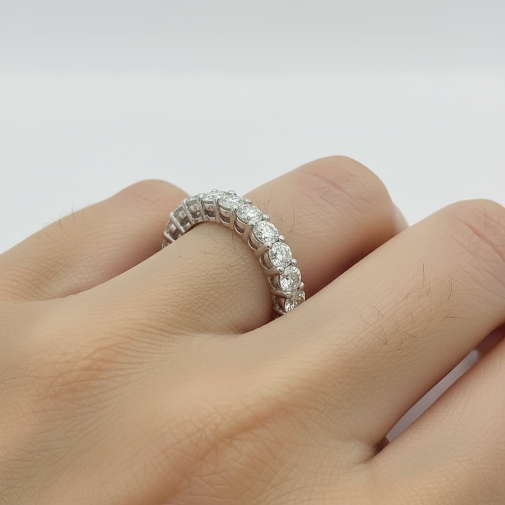 The Eternità Four-Prong Round Diamond Eternity Band