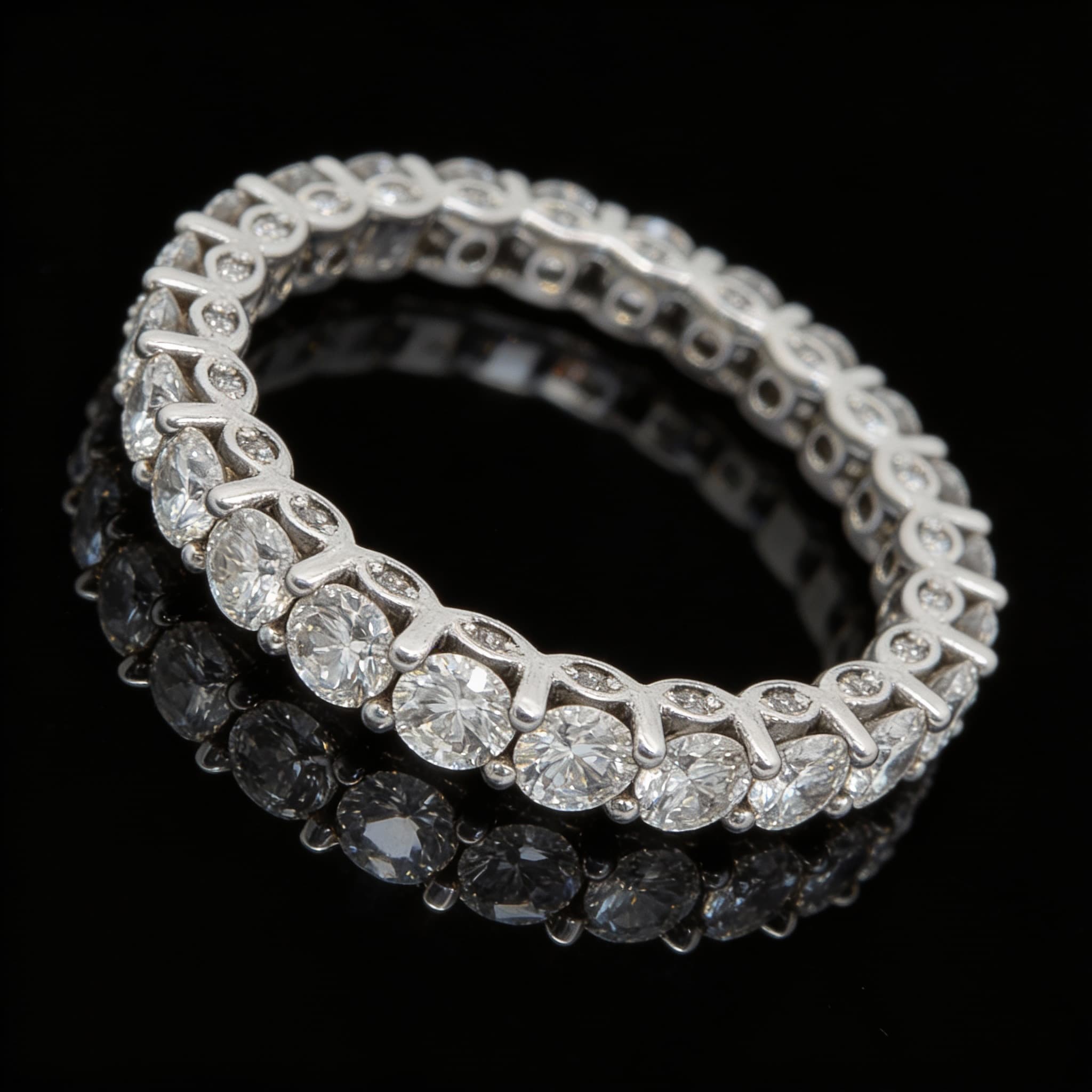 The Eternità Four-Prong Round Diamond Eternity Band - 6