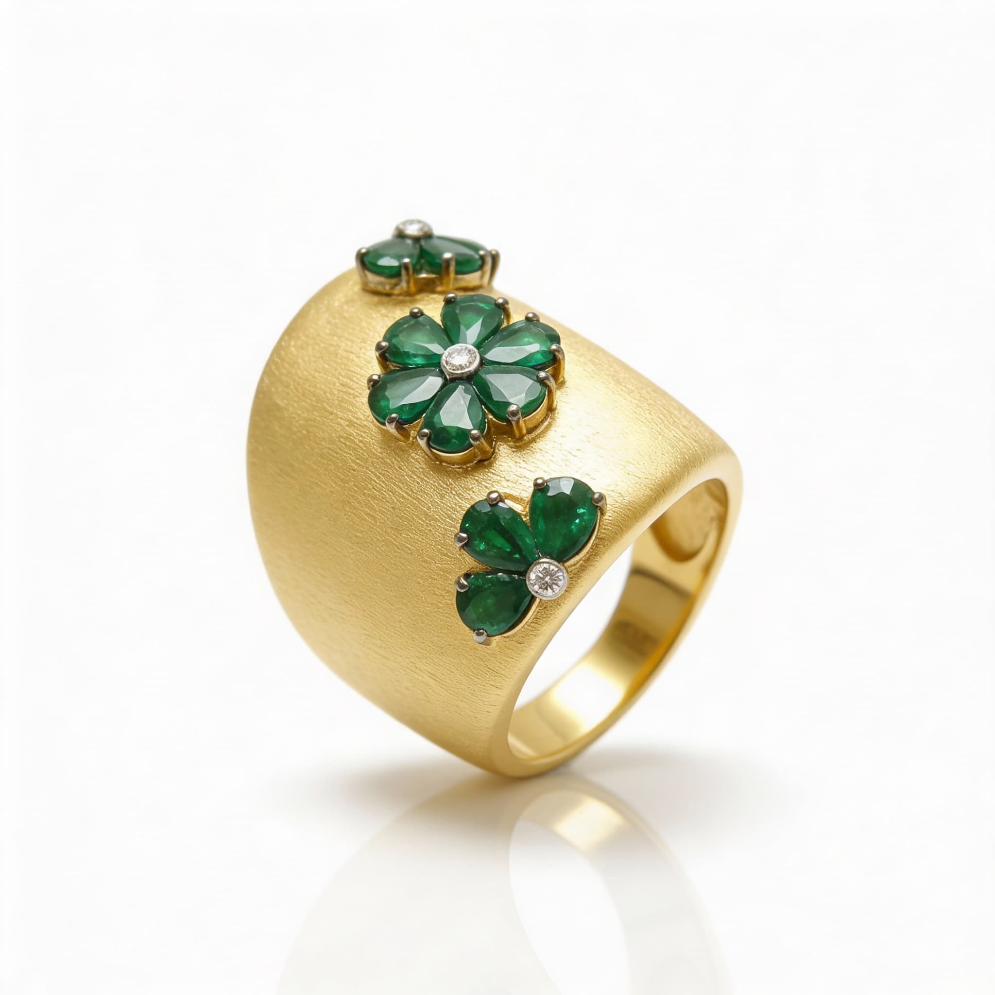 The Peregrinus Emerald Trio Bloom Ring